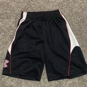 Under armor balck and red shorts.